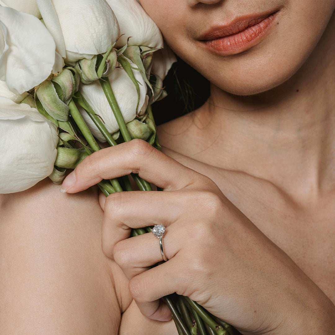 bride to be holding rose bouquet 