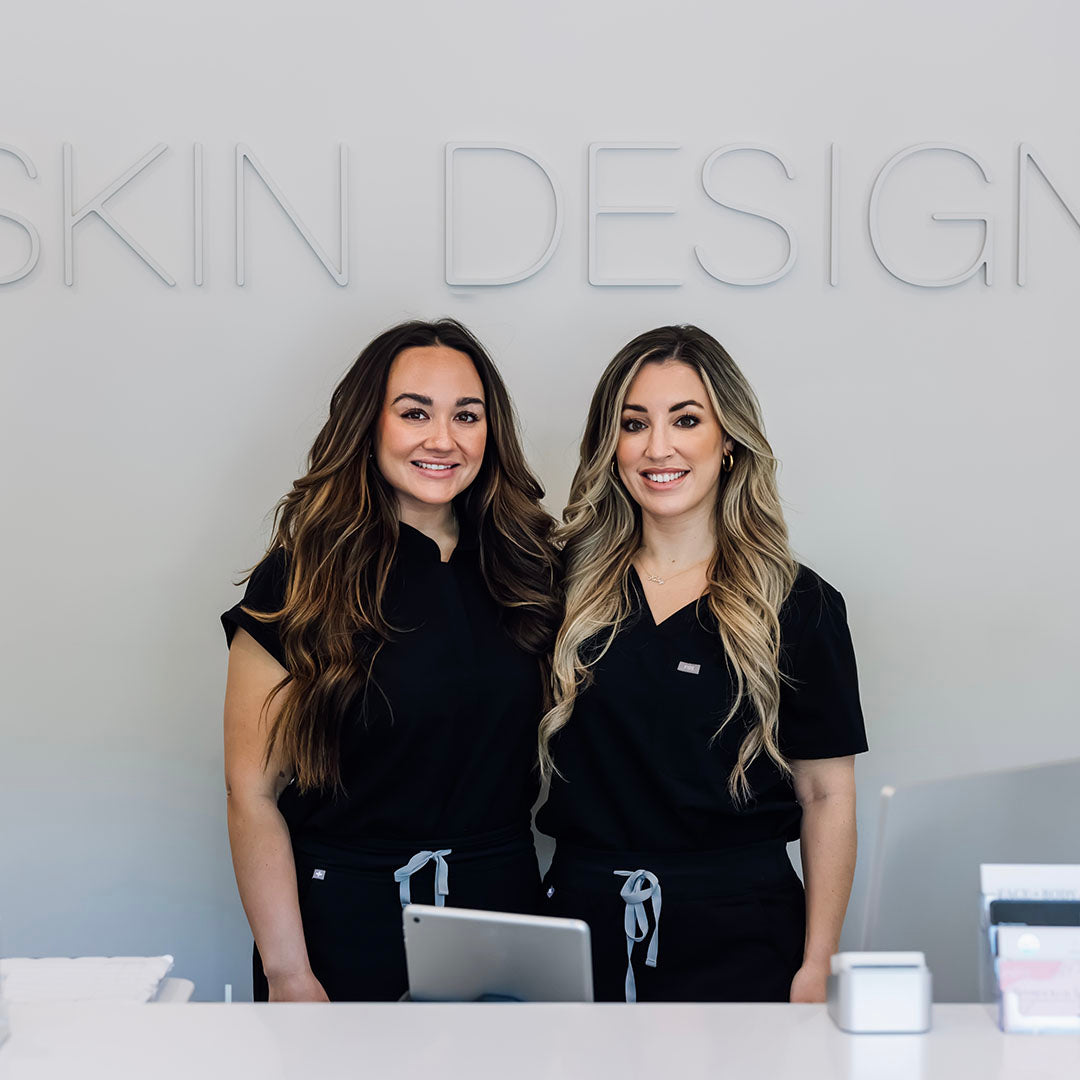 Jacquelyn Curran and Kristina Borrelli at front desk of Skin Design Aesthetics