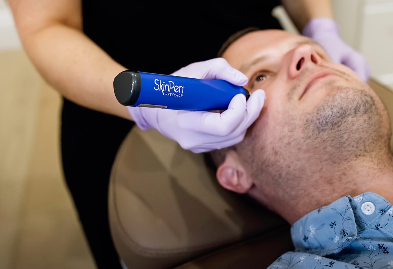 man receiving skinpen microneedling treatment performed at Skin Design Aesthetics Medical spa in South Shore, MA
