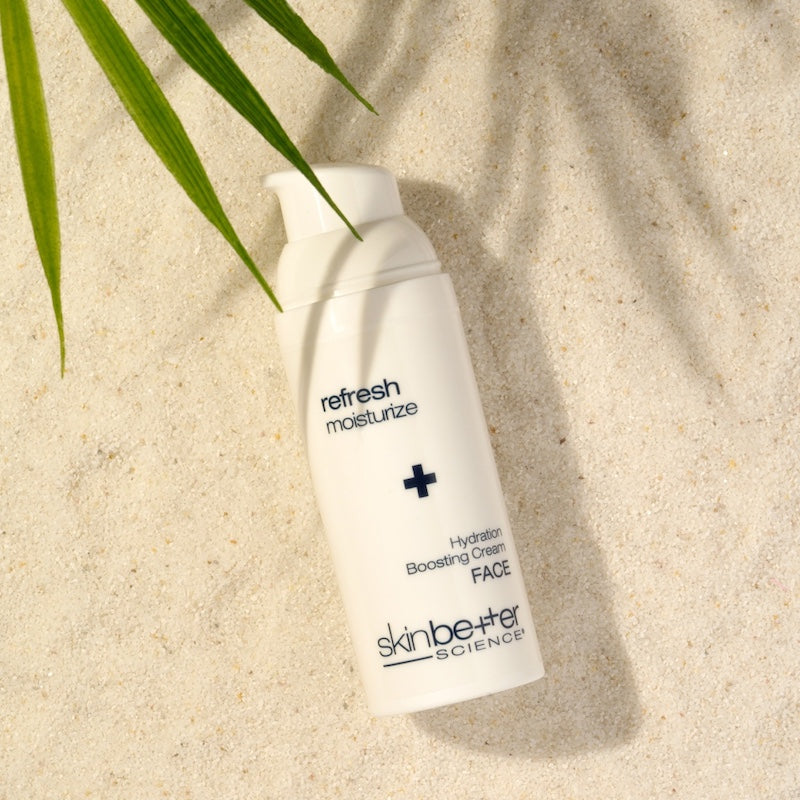 skinbetter hydration boosting cream face sand background